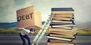 Woman carrying student loan debt 96230313